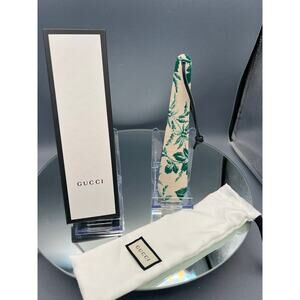 Rare Gucci Shoehorn featuring the brand's iconic green and cream Herbarium print